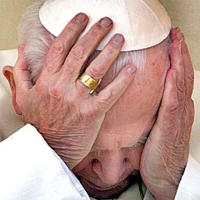 Pope John Paul II reacts during his general audience in St. Peter's square /AP